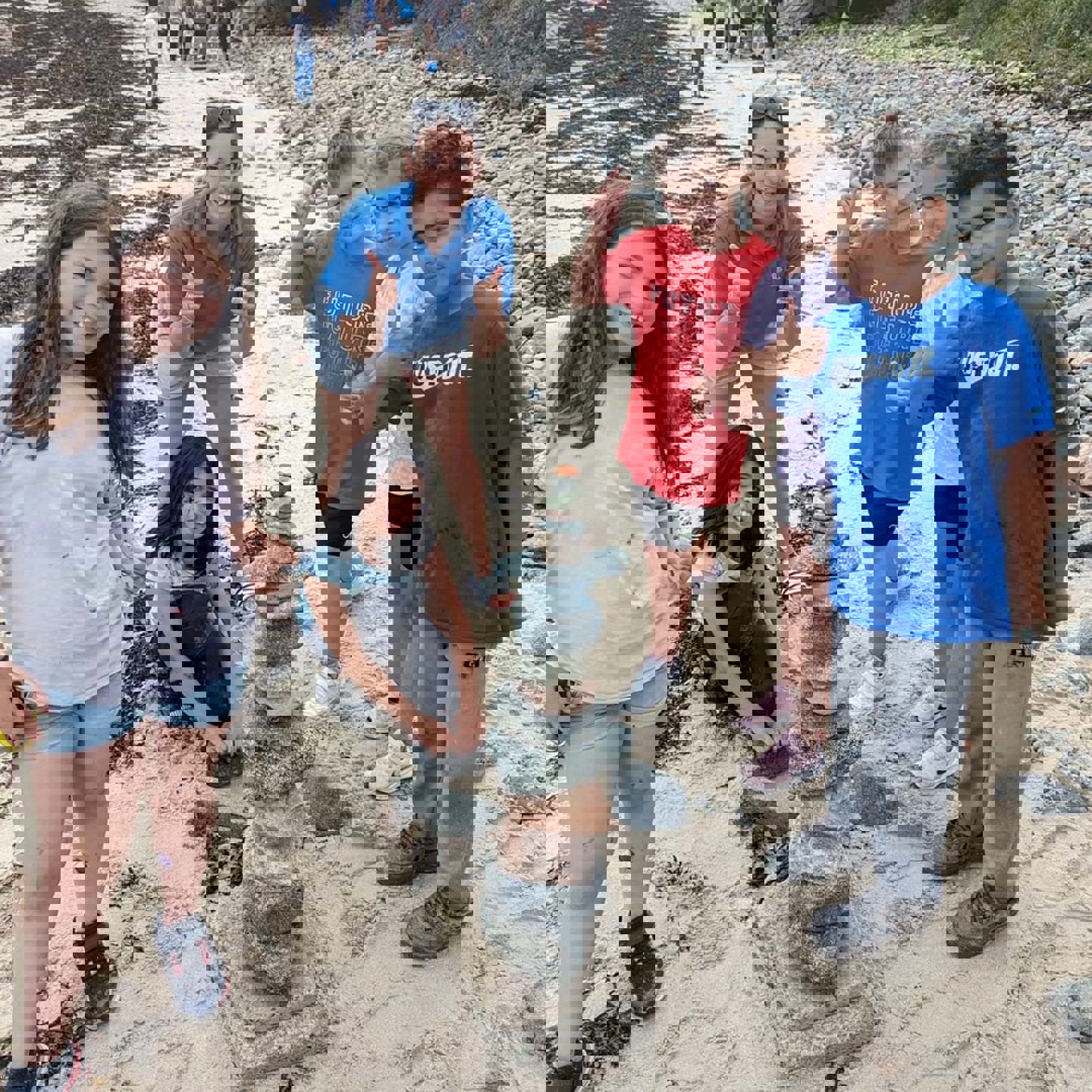 Kids creating stone statues