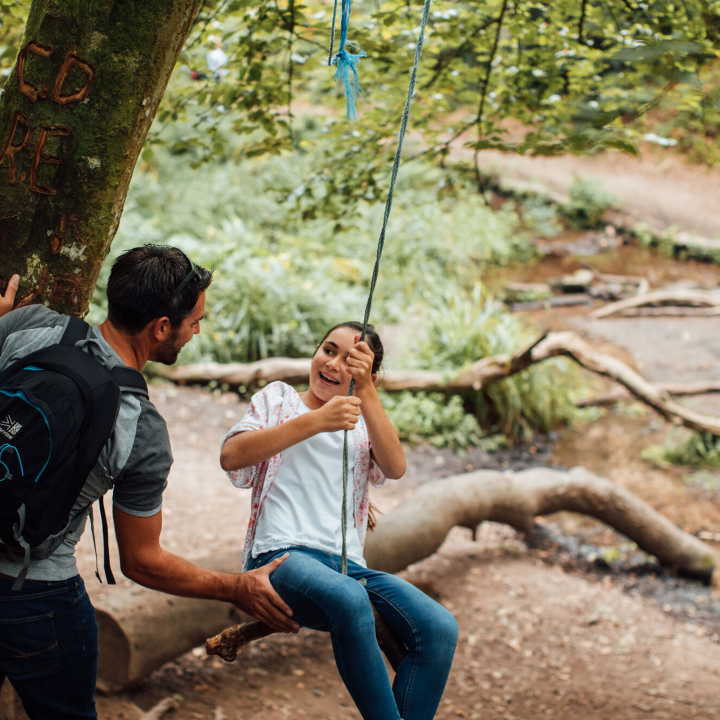 Girl on swing in St.Catherine’s Woods