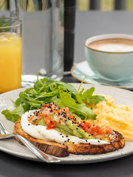 Food on plate with orange juice